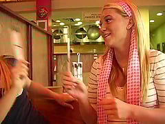 Two pleasurable blondes make some naughty things in a cafe