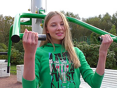 Teen lesbian babes play with toys after a workout indoors